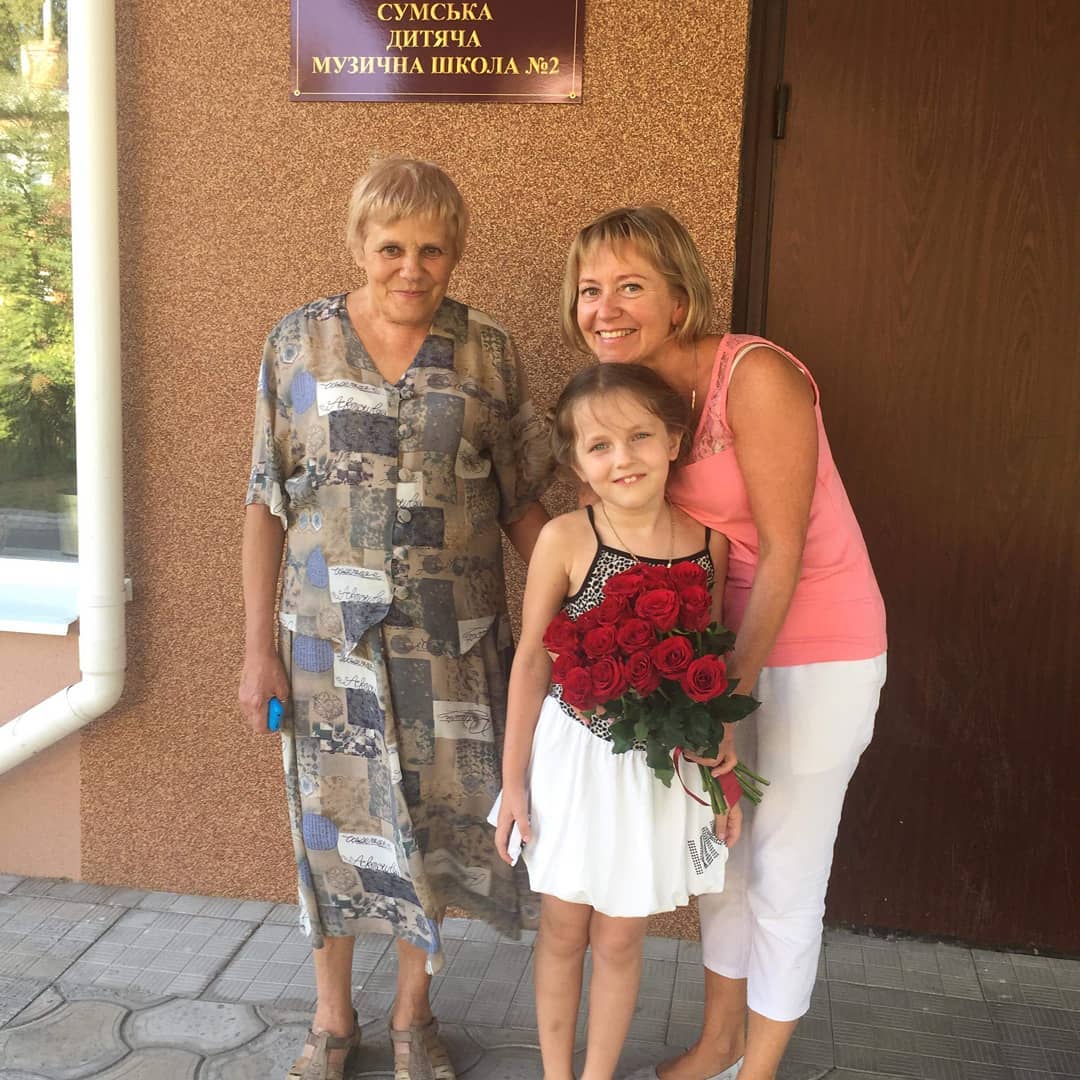 Larysa with friend and student