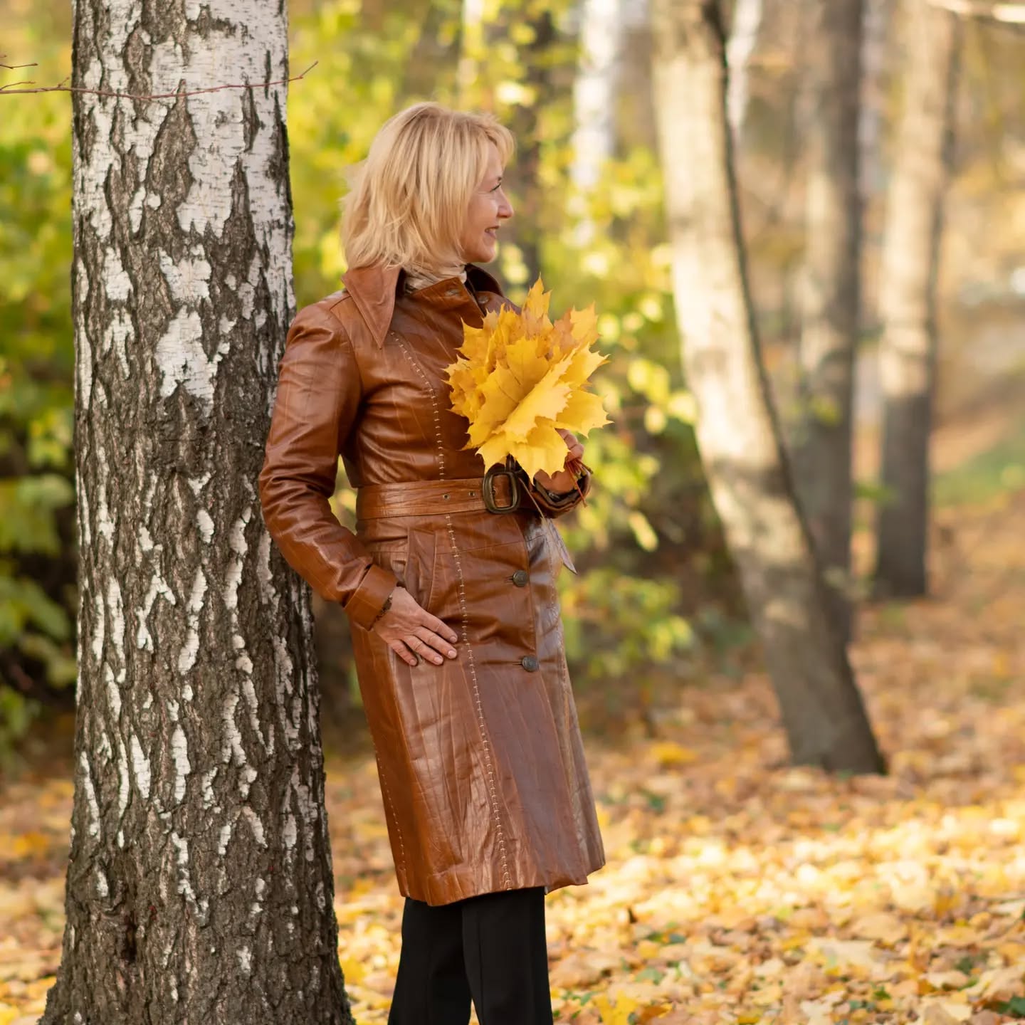 Larysa with autumn leaves